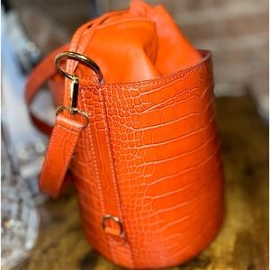 Lambskin leather bucket bag.